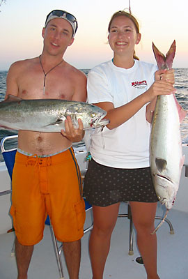 Anglers with bluefish